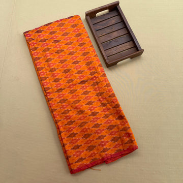 Orange Ikkat raw Silk Fabric