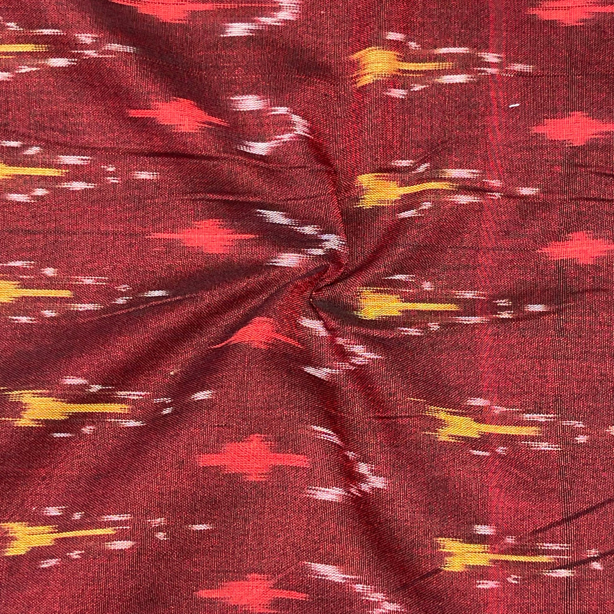 Mersiced Maroon Colour Ikkat Cotton Fabric