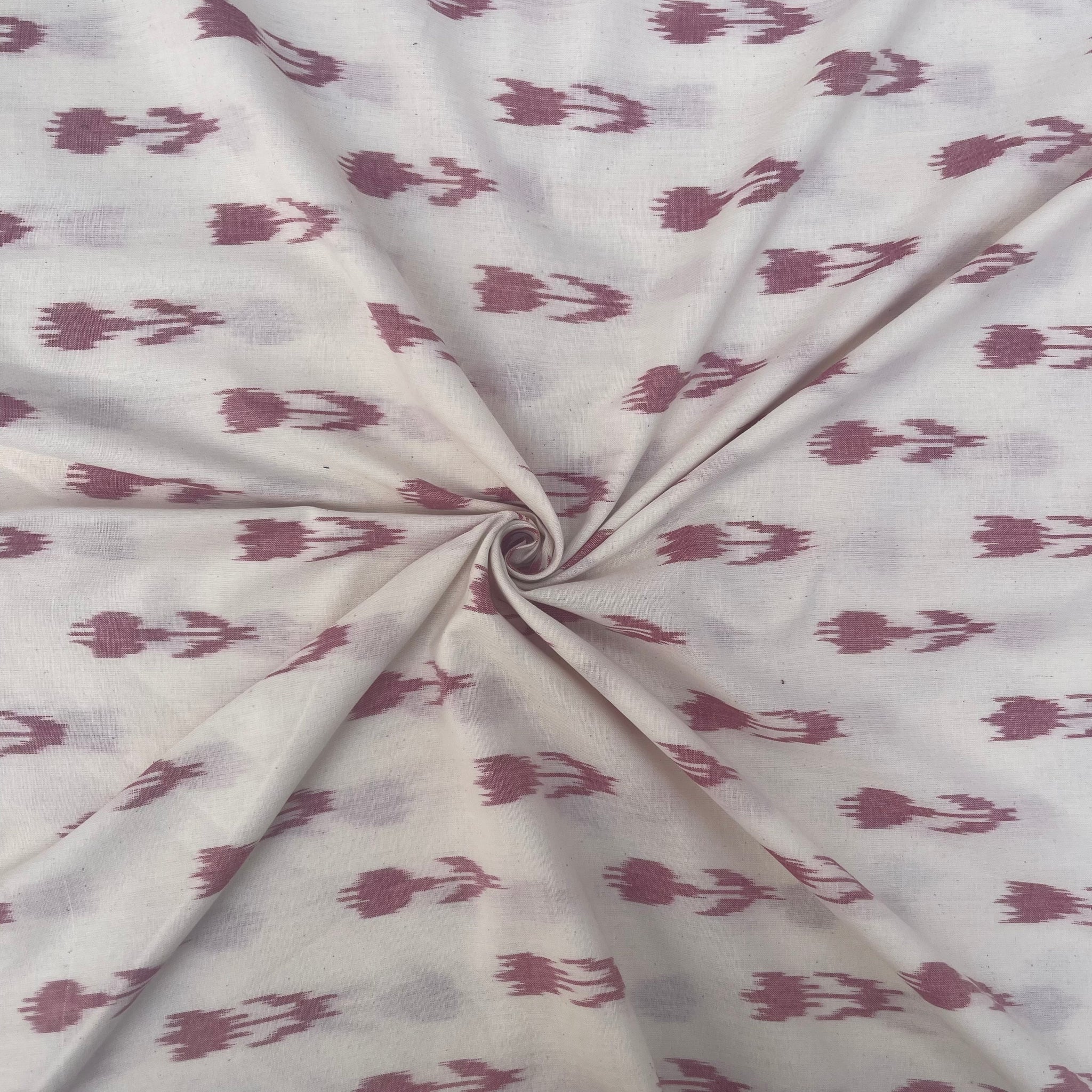 Off white Base Red Arrows Ikkat cotton fabric