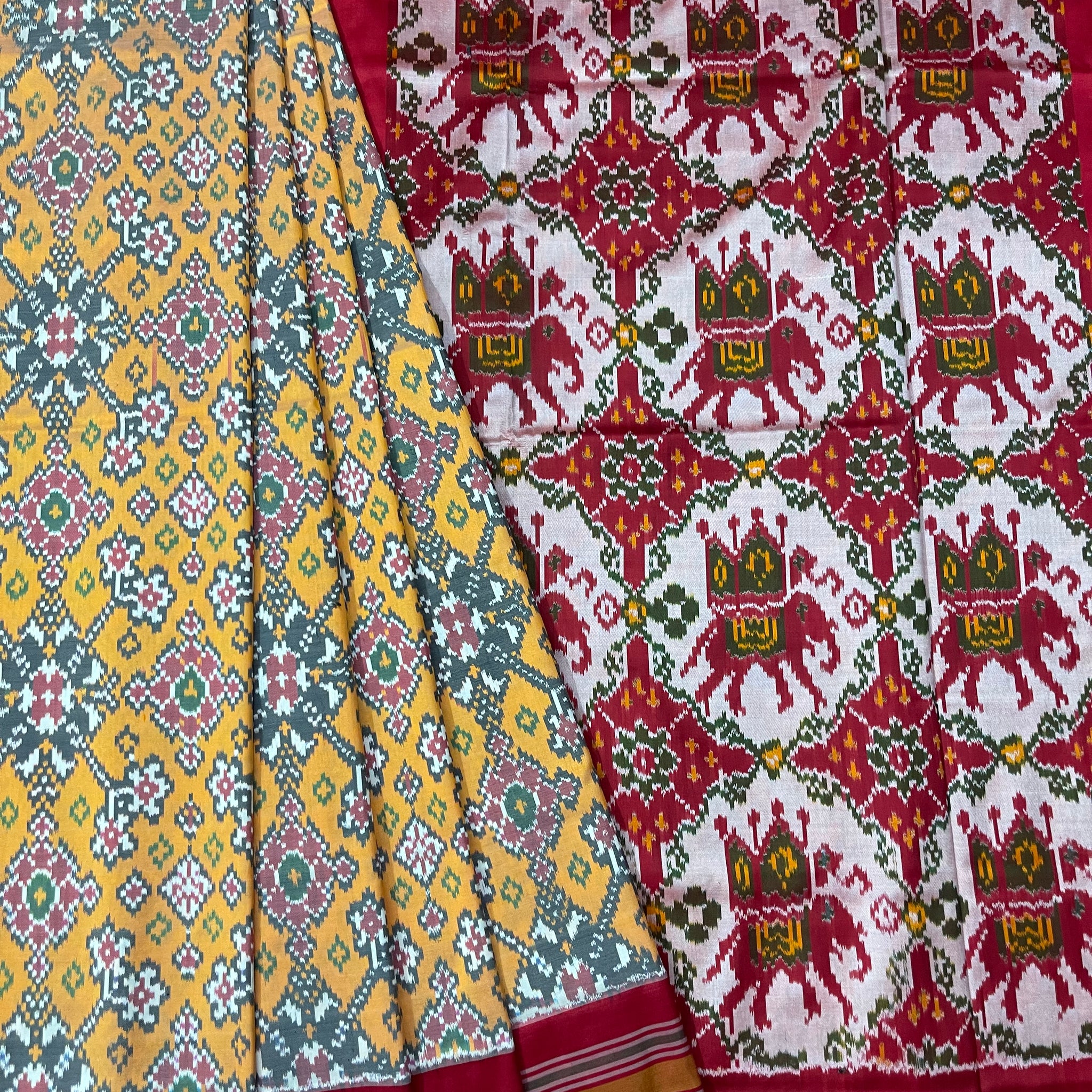 Narikuja Patola Ikkat Silk Sari In Mulberry silk
